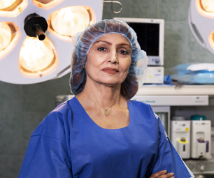 Dr. Aruna Mishra, Director, Gynecology, in Operating Room.